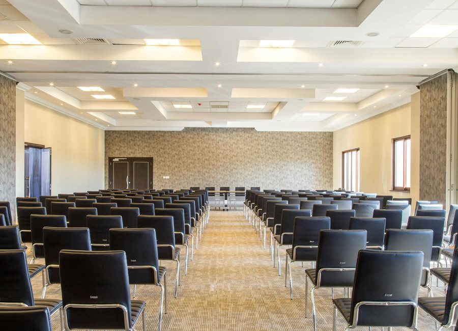 Conference room setup with rows of seating