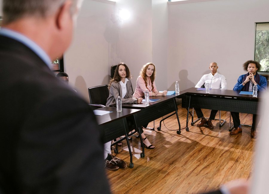 Workshop room with attendees and facilitator